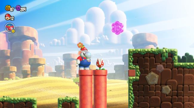 Elephant mario standing on a red pipe next to a piranha plant. A large purple coin is above them.